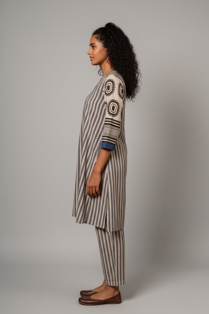 Embrace effortless sophistication with this contemporary striped kurta set